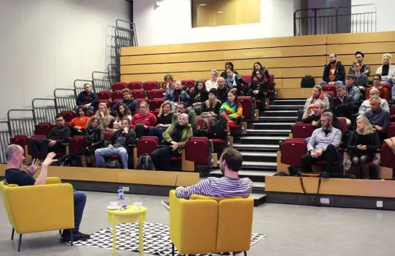 Photographer Eamonn Doyle speaks to a group of students and staff at Griffith College Dubin