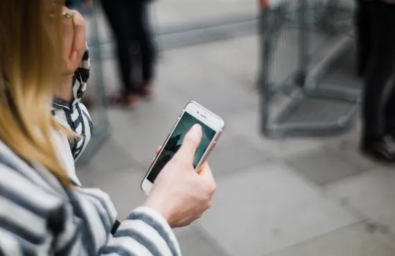 A woman using her mobile phone