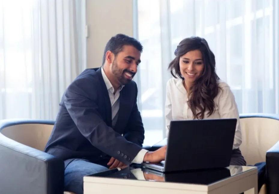 image of two people having a meeting