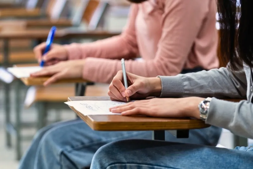 How To Deal With Exam Stress - Woman Writing Exam