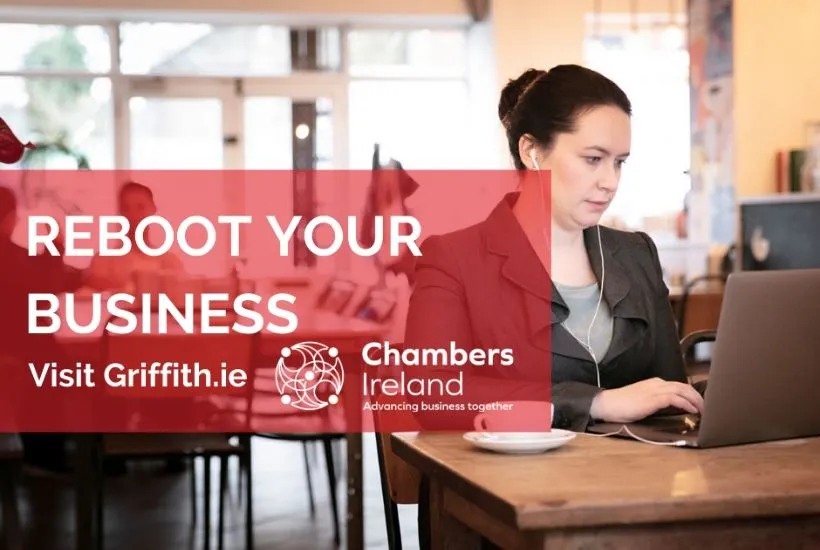 Reboot your business with Chambers Ireland and Griffith College A woman using her laptop at a table to access the Chambers Ireland and Griffith College business planning course