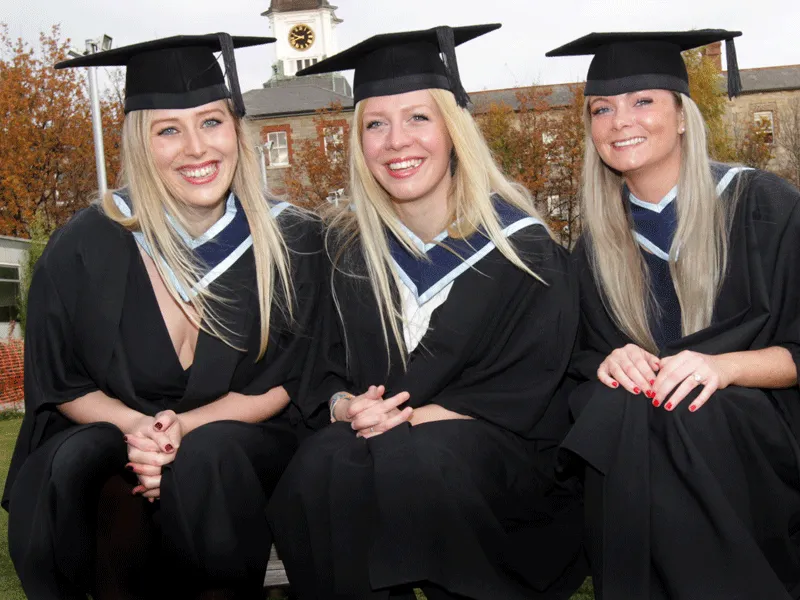 Three Griffith College Graduants Graduants Pose for a picture