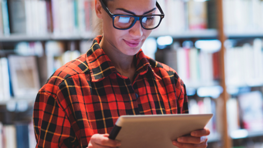 woman looking at ipad