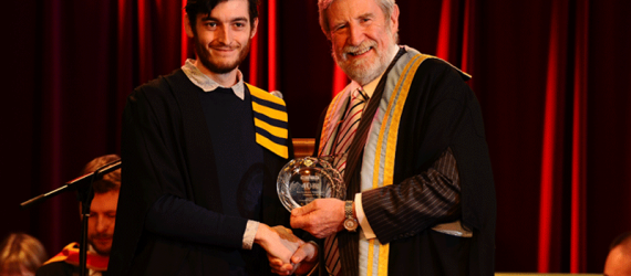 Diarmuid Hegarty Hands parchment to student