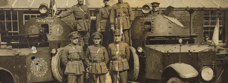 Free State officers in front of armoured cars. Centre in the front row is Tom Ennis, who commanded the National Army takeover of Wellington Barracks. (Courtesy of the National Library of Ireland) Free State officers in front of armoured cars. Centre in the front row is Tom Ennis, who commanded the National Army takeover of Wellington Barracks. (Courtesy of the National Library of Ireland)