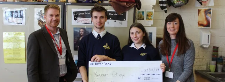 Griffith College provides bursaries and resources to schools across the country Griffith College Schools Liaison Officer presents a bursary check to students at Kylemore College