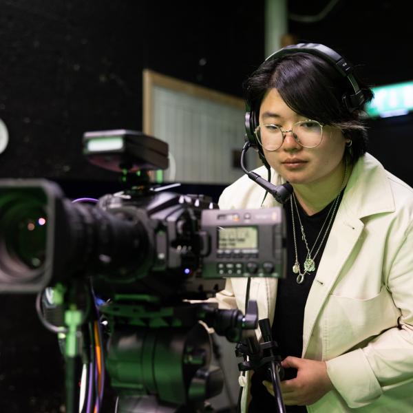 Student using the TV equipment