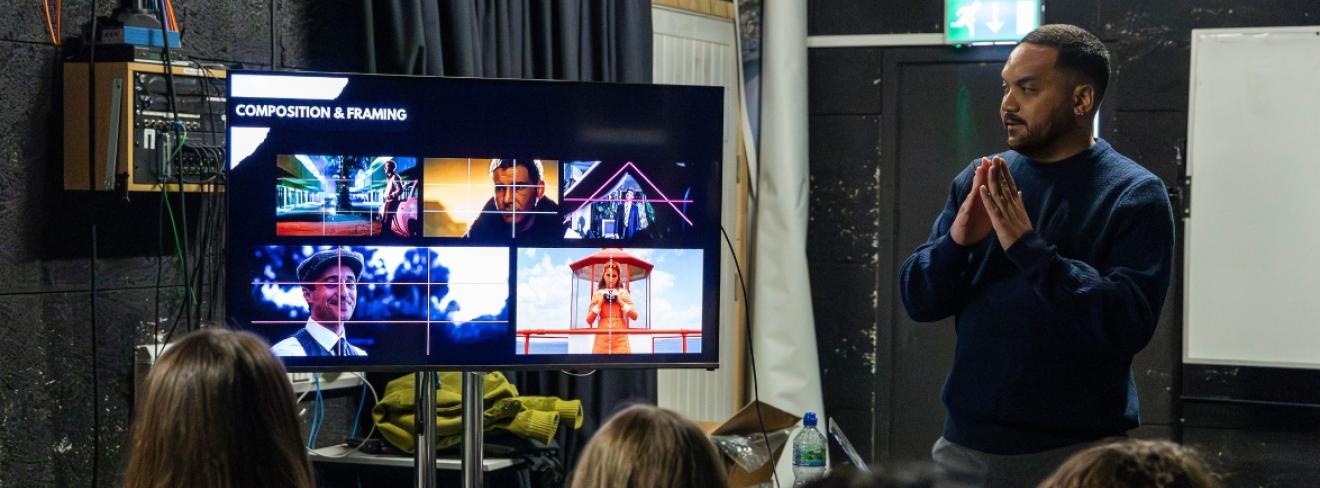 Blog - Header, Arthur Lopez talking to students