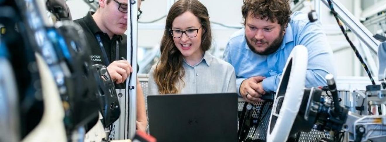 Apprenticeship incentive for employers to the value of €3000 Three apprentices around a computer