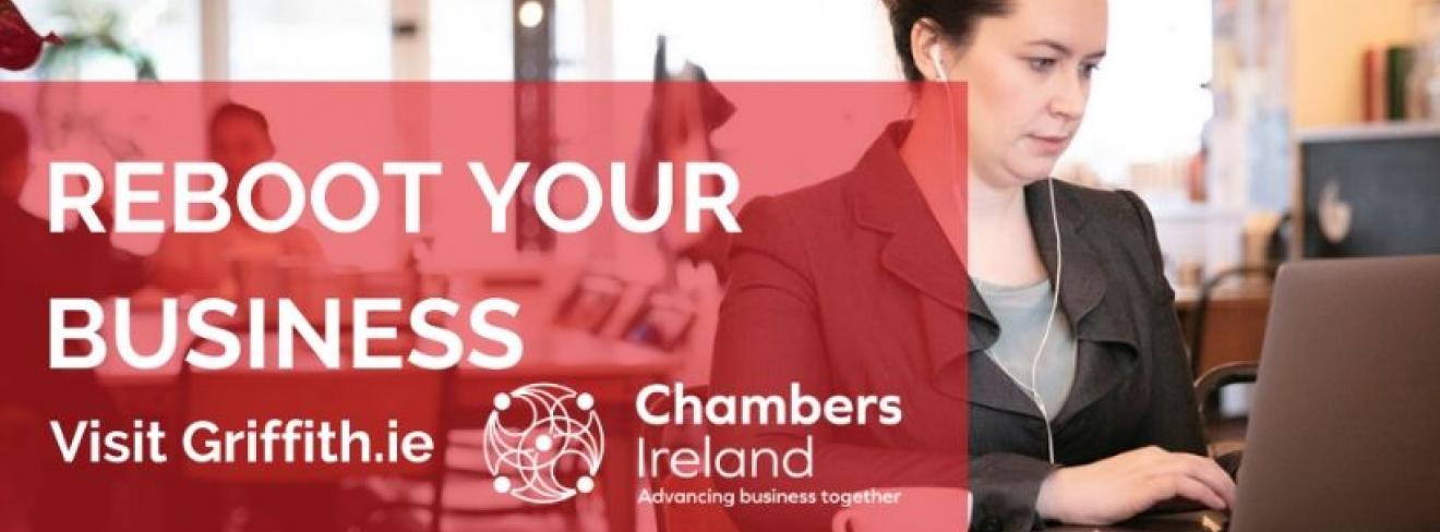 Reboot your business with Chambers Ireland and Griffith College A woman using her laptop at a table to access the Chambers Ireland and Griffith College business planning course