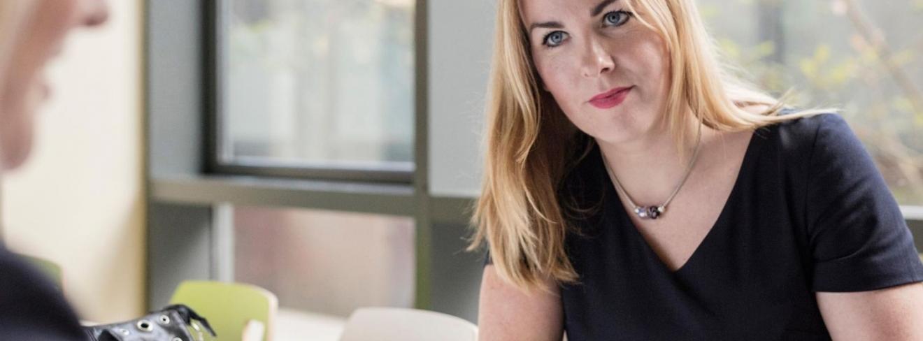 Fully funded Springboard+ courses with Griffith College Woman sitting at desk